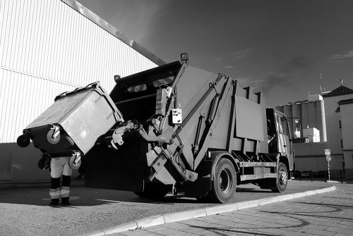 Rubbish removal team handling waste in Nunawading