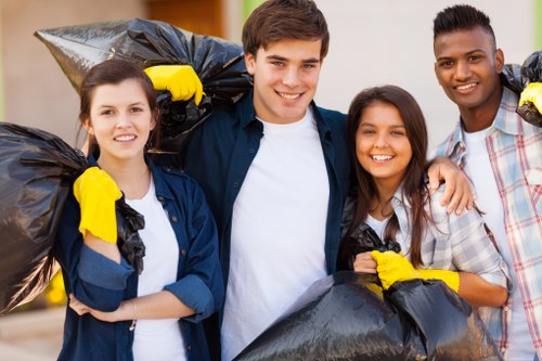 Dandenong rubbish removal team handling waste containers