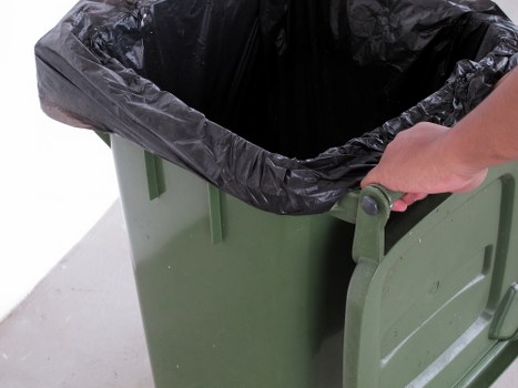 Construction debris being cleared by rubbish removal professionals